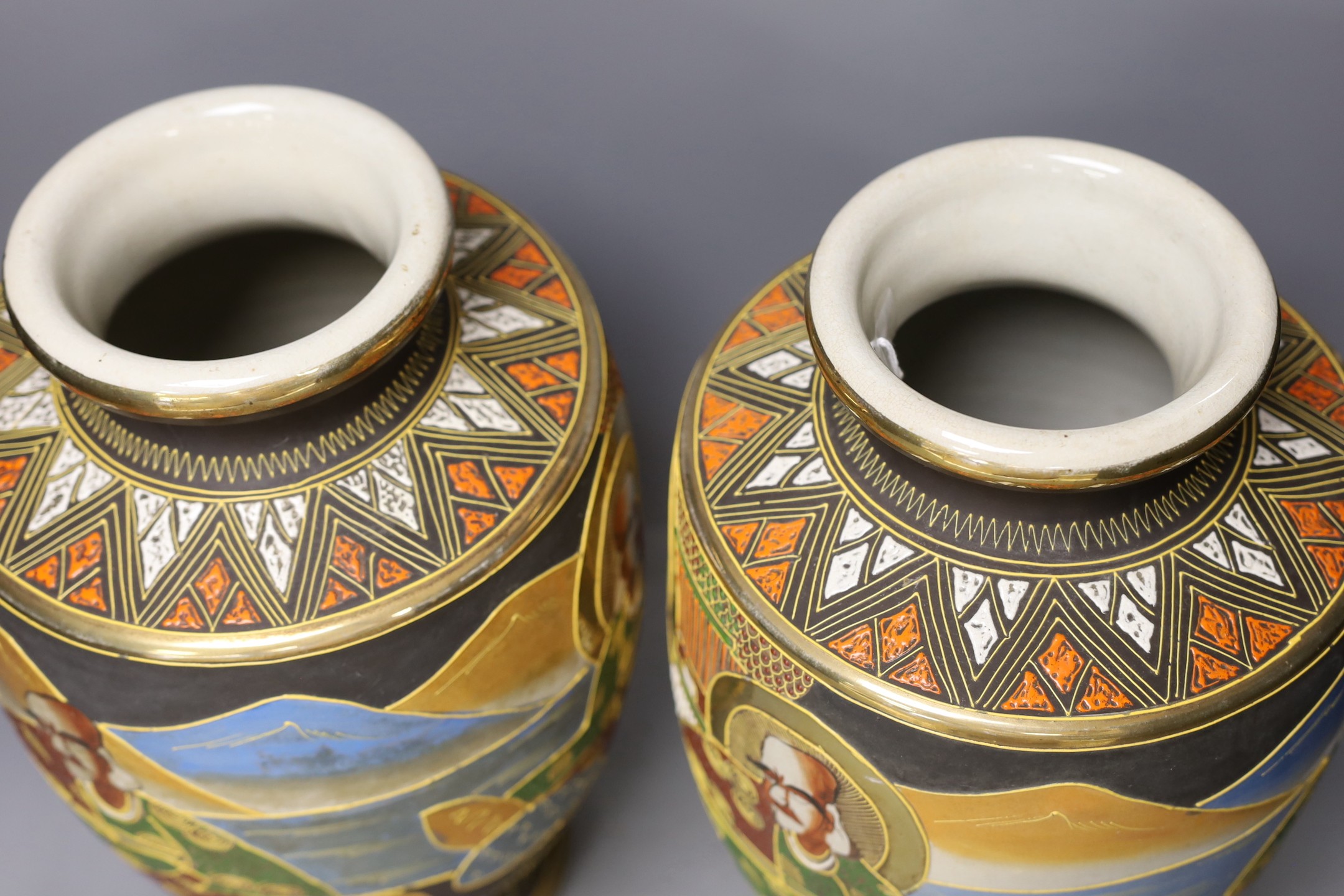 A pair of painted Japanese vases, marked to base - 36.5cm tall